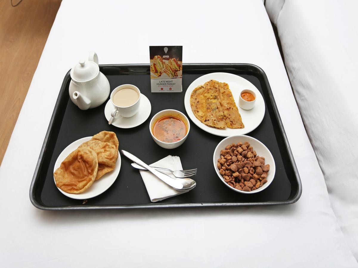 Oyo 10425 Queens Pearl Inn Dehradun Bagian luar foto